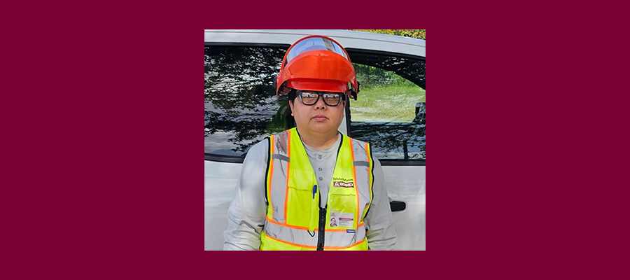 Sylvia Rafanan wearing PPE and a high-vis safety vest.