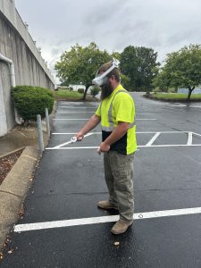 Bermex utility locator technician using a VR headset and locating equipment during training