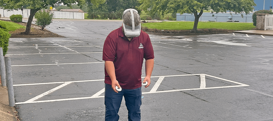 Bermex utility locator technician using a virtual reality headset during training